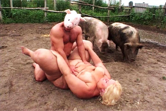 Fat blonde slut fucked in the mud with pigs.