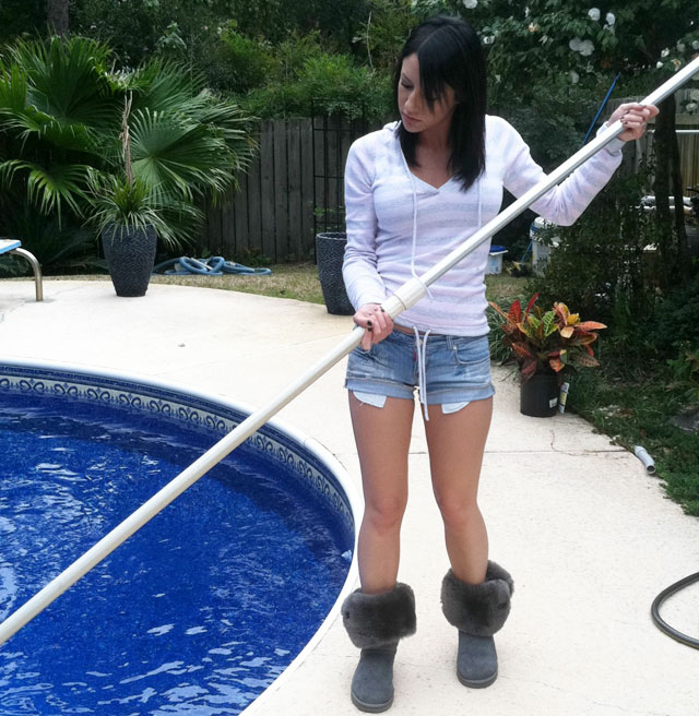 Dawn Avril Exposed personal home pics of Dawn Avril cleaning her pool in some jean shorts and boots.