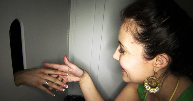 Horny girl Shelby Caldera shows up at the gloryhole while Taylor is in the booth.