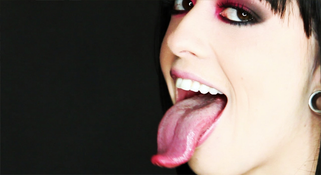 Alt pornstar Larkin Love has a long tongue.