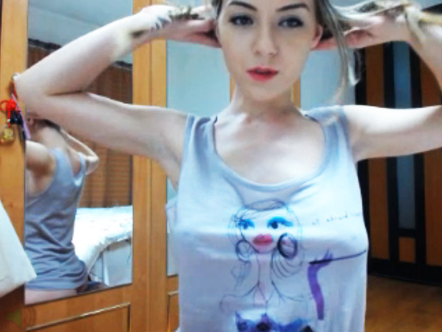 All natural busty cam girl in braided pigtails Angelserena showing her tits and ass!