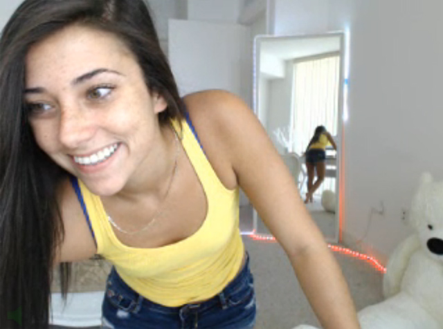 Cute petite brunette Codi live spanking tight ass jean shorts.