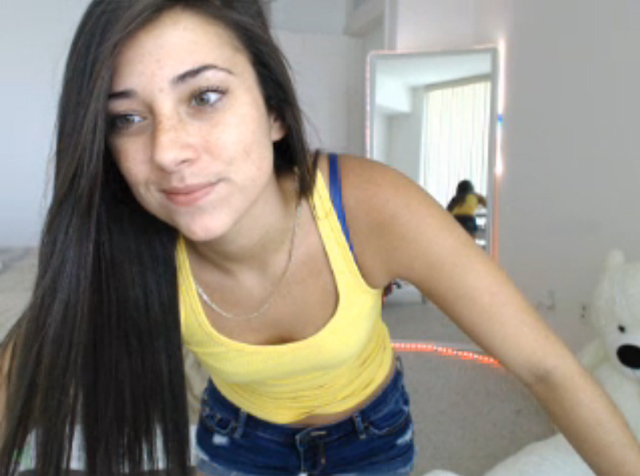 Cute petite brunette Codi live spanking tight ass jean shorts.