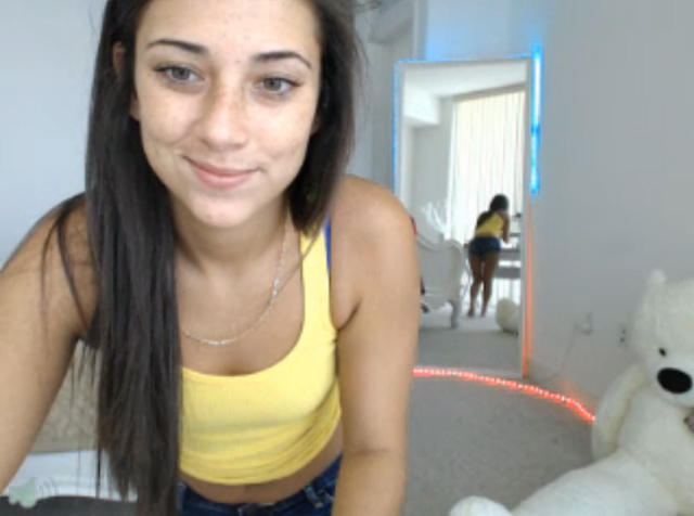 Cute petite brunette Codi live spanking tight ass jean shorts.