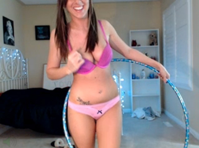 Cute busty girl next door hula hooping live on webcam.