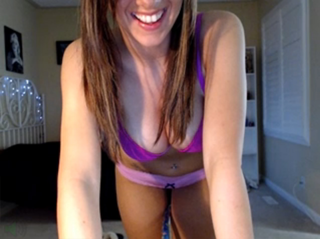 Cute busty girl next door hula hooping live on webcam.