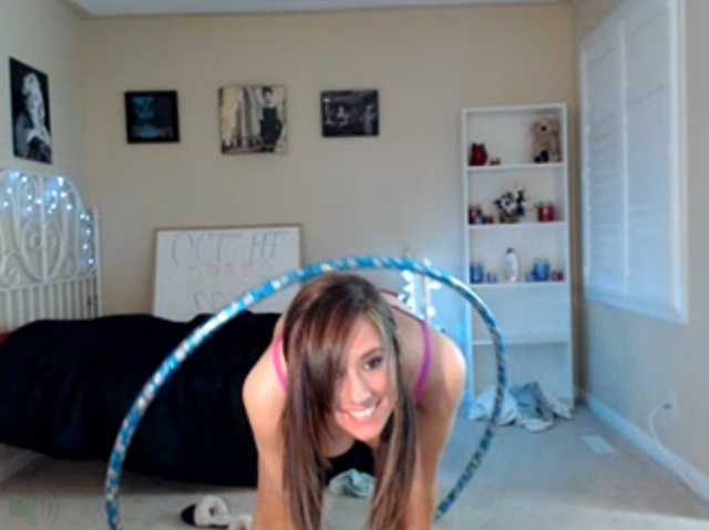 Cute busty girl next door hula hooping live on webcam.
