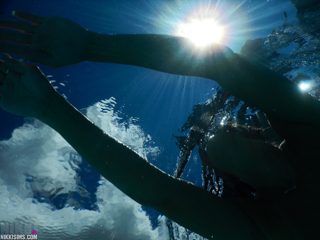 Nikki Sims bikini suntanning swimming underwater topless hd photos skinny dipping.
