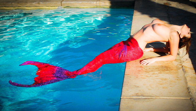 Carlotta Champagne sexy swimming topless mermaid nude wet babe fantasy porn pictures.