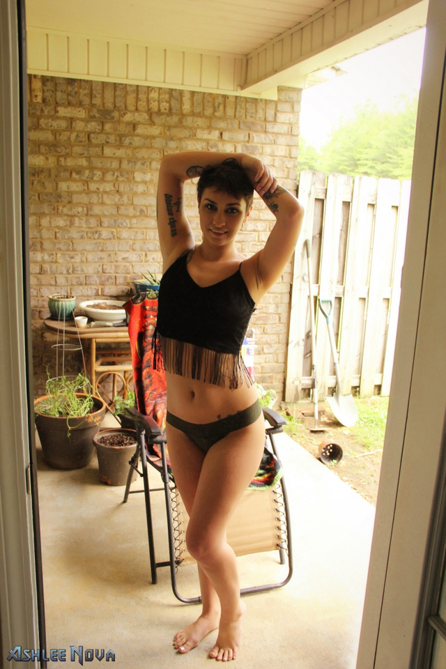 Inked solo hottie Ashlee Nova masturbation zip set orgasming on the patio with toys.
