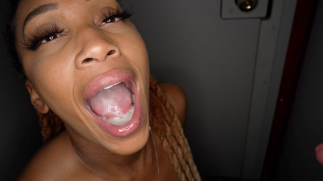 Sexy Black amateur babe gloryhole blowjobs cum swallowing gangbang by strangers in theater room at adult video store 4K xxx.