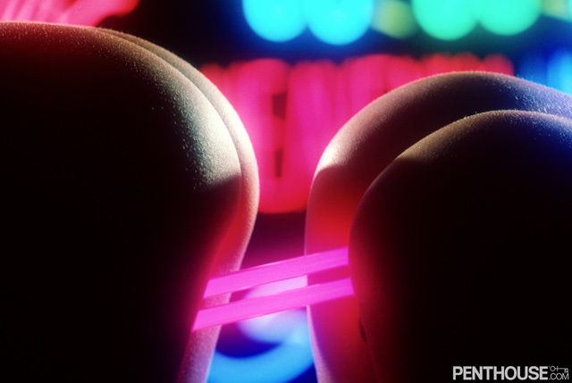 Neon Nights retro porn April 1999 issue of Penthouse Magazine Samantha and Trina shot by Earl Miller in glowing hot lesbian porn.