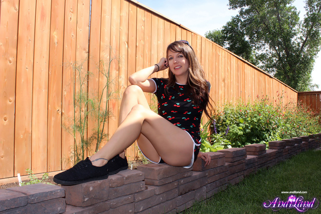 Very cherry solo girl hottie Andi Land public flashing her nice natural tiits and tight ass in the backyard.