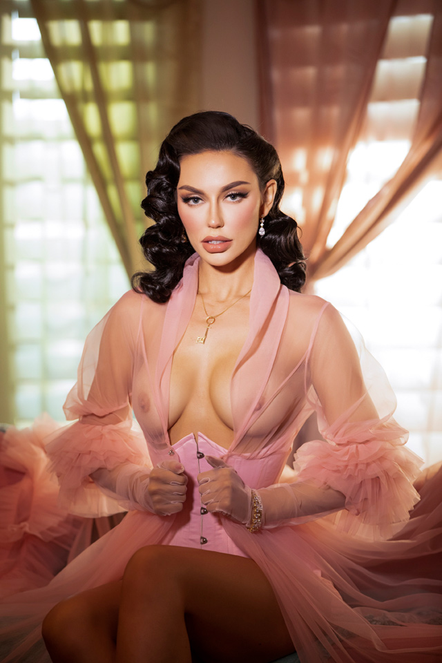 Burlesque star and model Bryona Ashly is the Penthouse Pet for March 2023 as shown in this dainty corset lingerie and gloves in sexy nude photos and a glamorous POTM video.